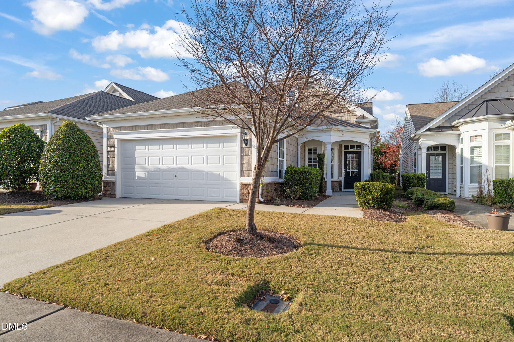 a house view with a garden space