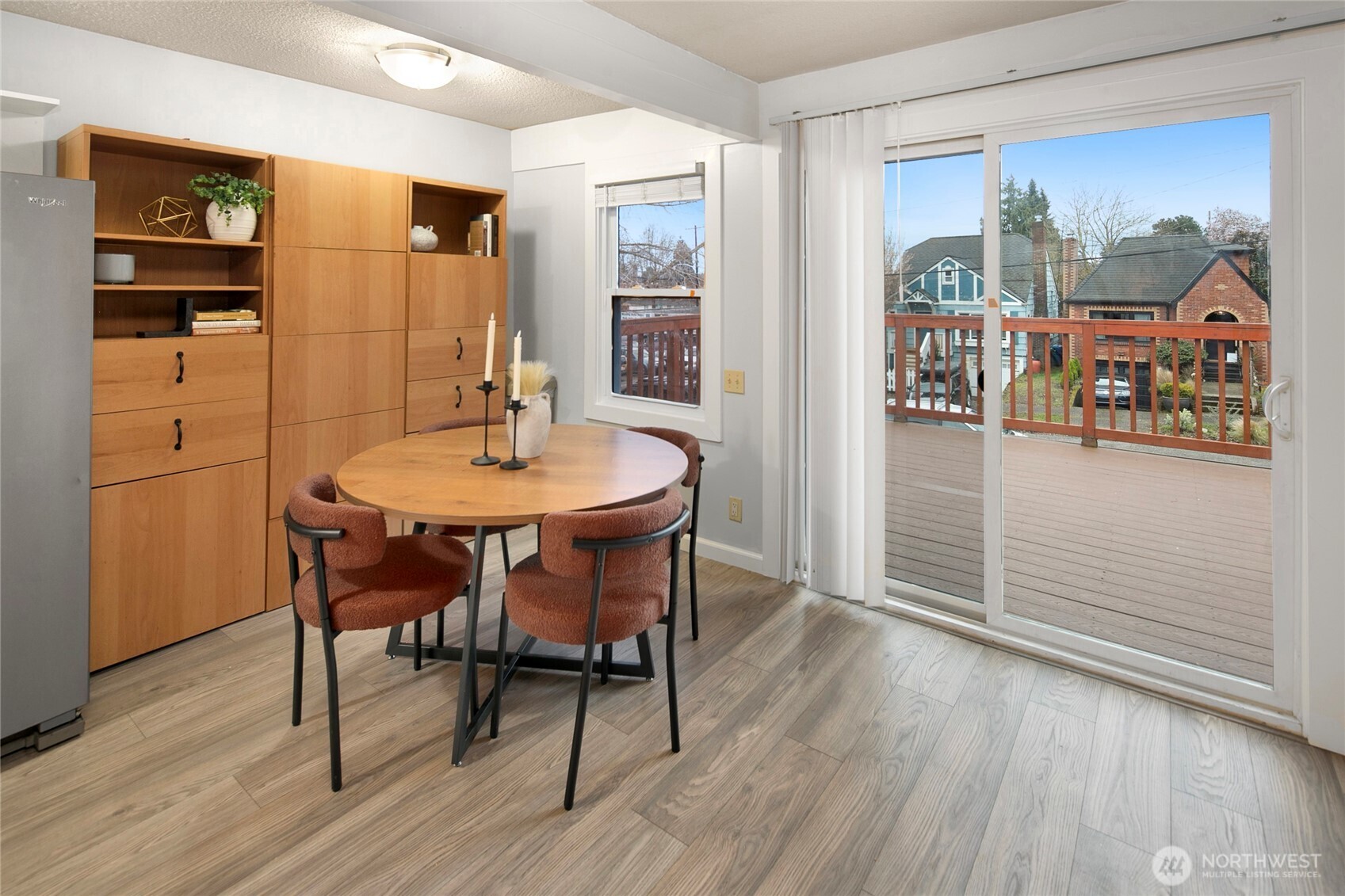 942 North 82nd Street Seattle, WA 98103 - Photo 7 of 16 a dining room with furniture and wooden floor