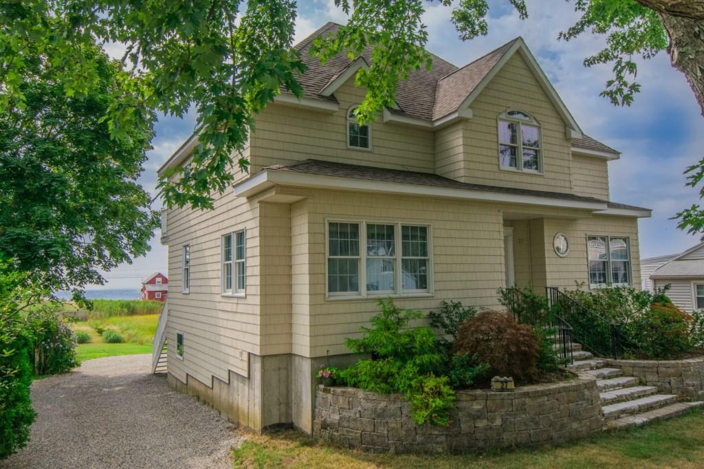 27 Mels Road Westbrook, CT 06498 - Photo 1 of 1 front view of a house with a yard