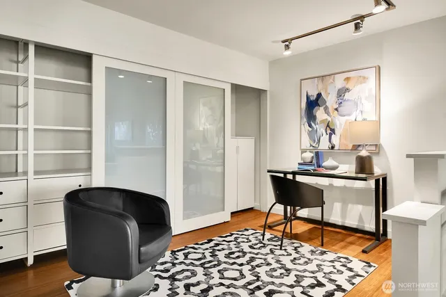 a living room with a couch and a window