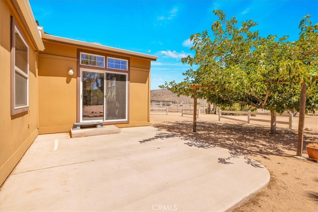 5175 Tom Mix Road Pioneertown, CA 92268 - Photo 34 of 58 a view of a house with a snow on the road