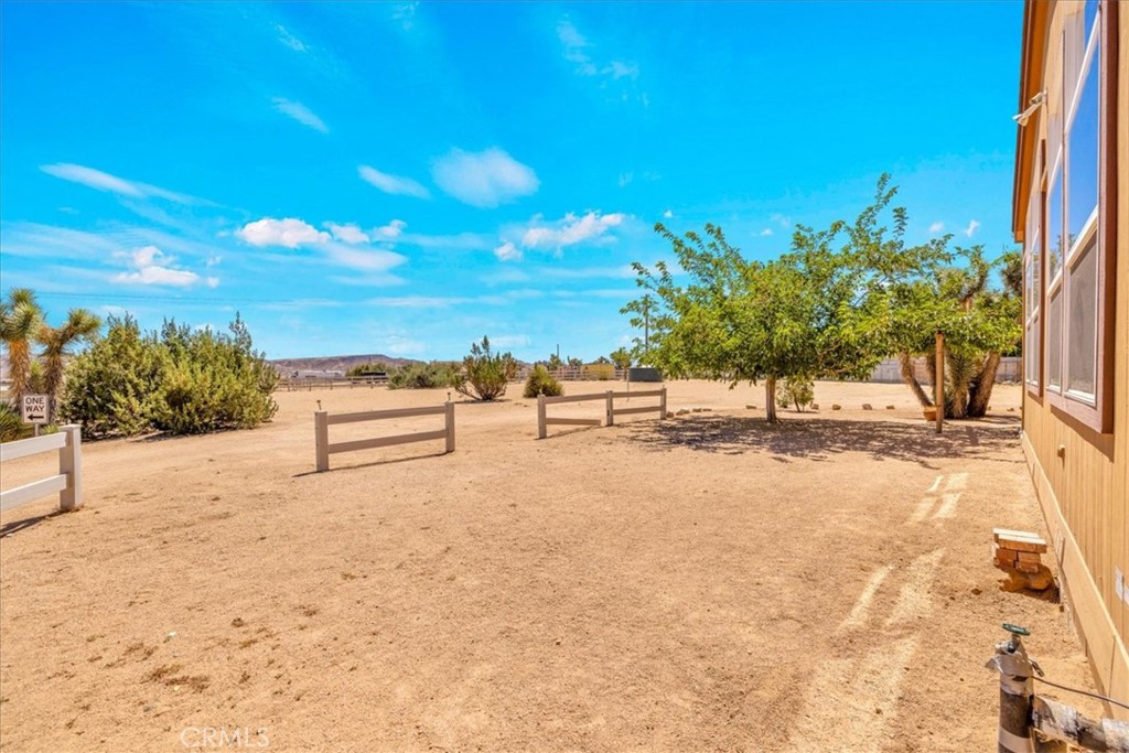 5175 Tom Mix Road Pioneertown, CA 92268 - Photo 36 of 58 a view of backyard of a house
