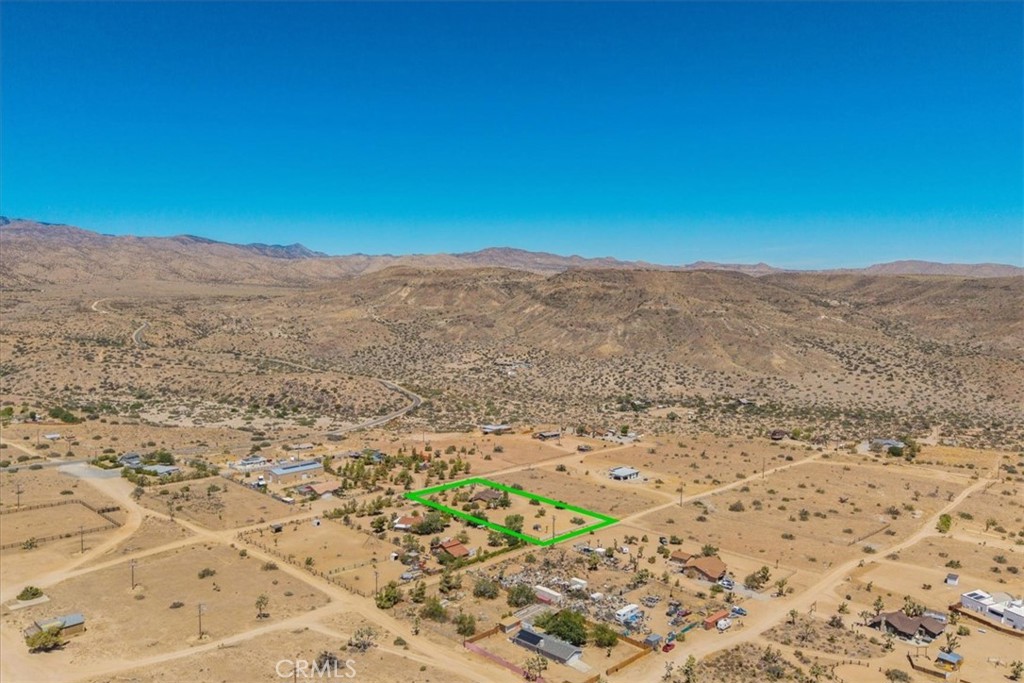 5175 Tom Mix Road Pioneertown, CA 92268 - Photo 55 of 58 a view of mountain view with wooden floor