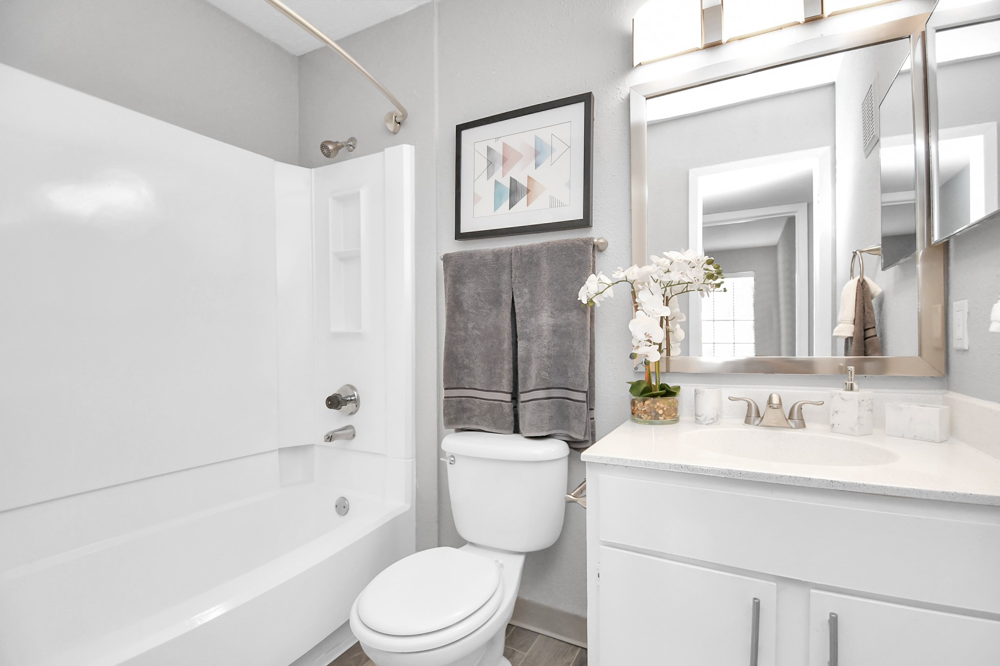 2701 West Bellfort Avenue, Unit 521 Houston, TX 77054 - Photo 18 of 44 a bathroom with a toilet a sink and a bathtub