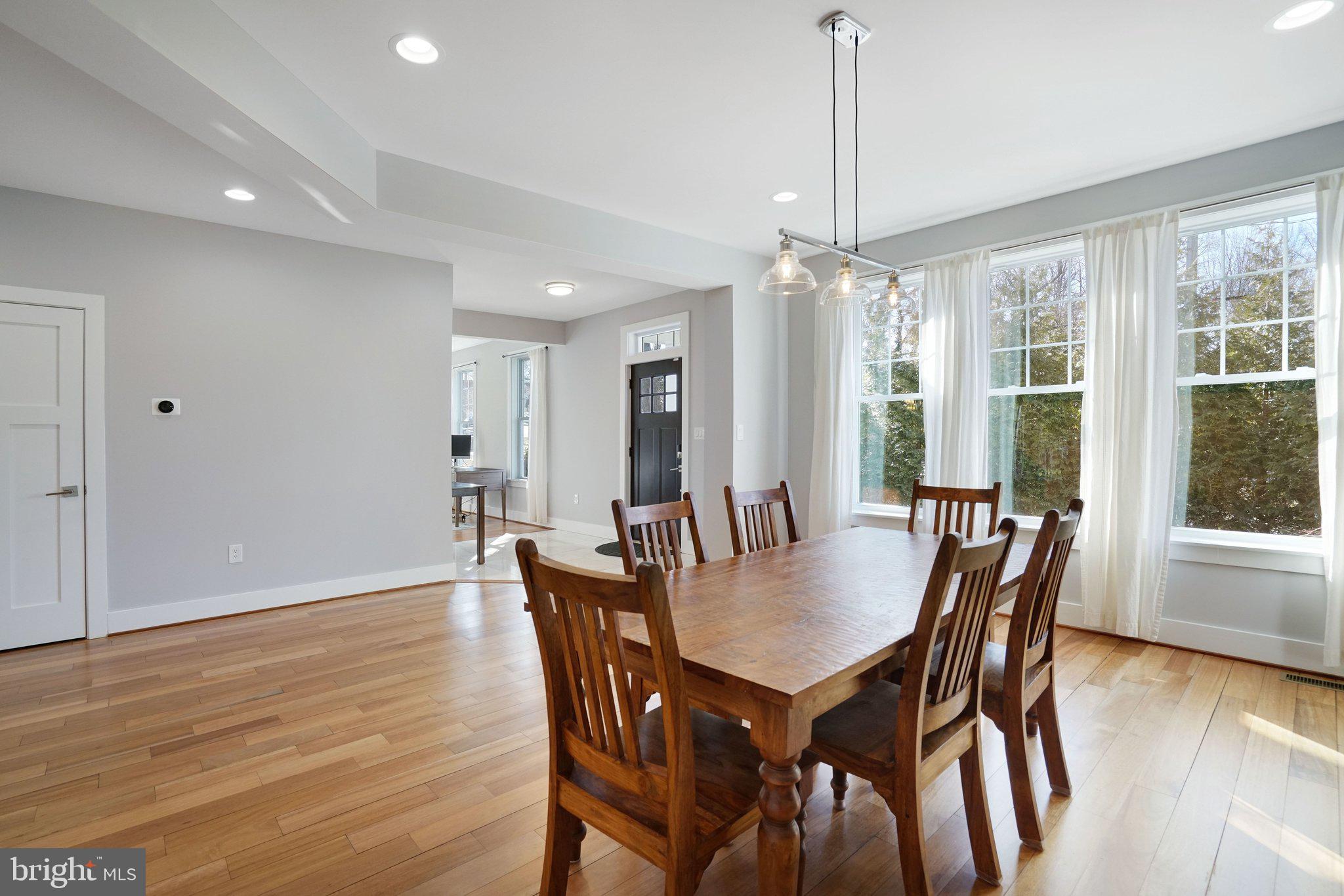 3731 Duke Street Alexandria, VA 22304 - Photo 17 of 57 a view of a dining room with furniture window and wooden floor