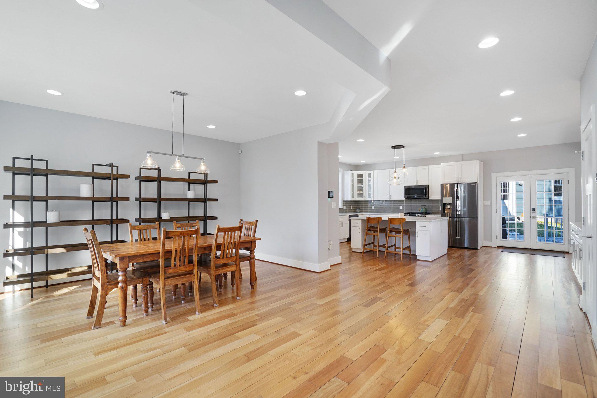 3731 Duke Street Alexandria, VA 22304 - Photo 18 of 57 a view of a dining room with furniture and wooden floor