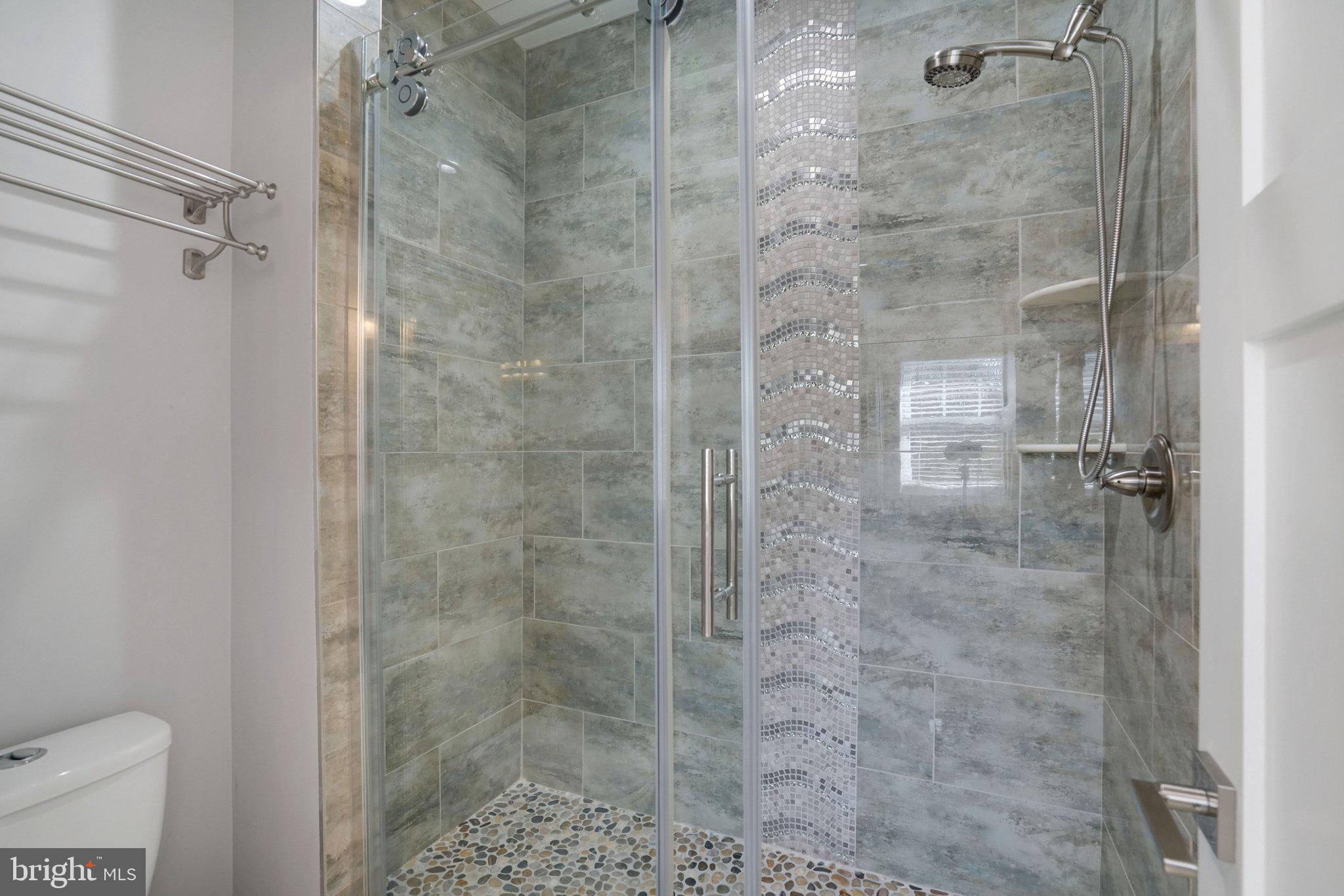 3731 Duke Street Alexandria, VA 22304 - Photo 25 of 57 a bathroom with a shower