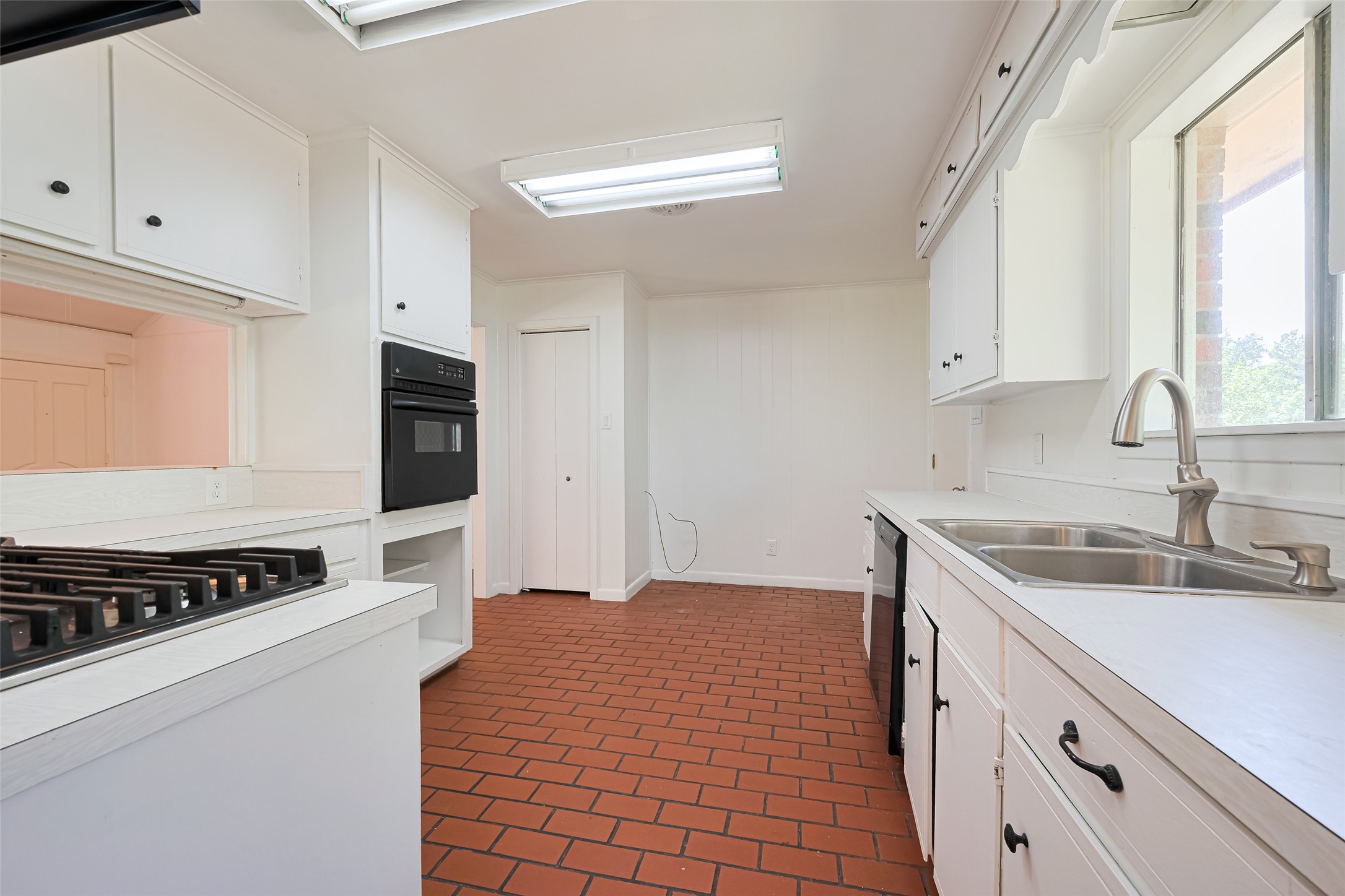 30525 Hegar Road Hockley, TX 77447 - Photo 12 of 49 a kitchen with a sink and cabinets
