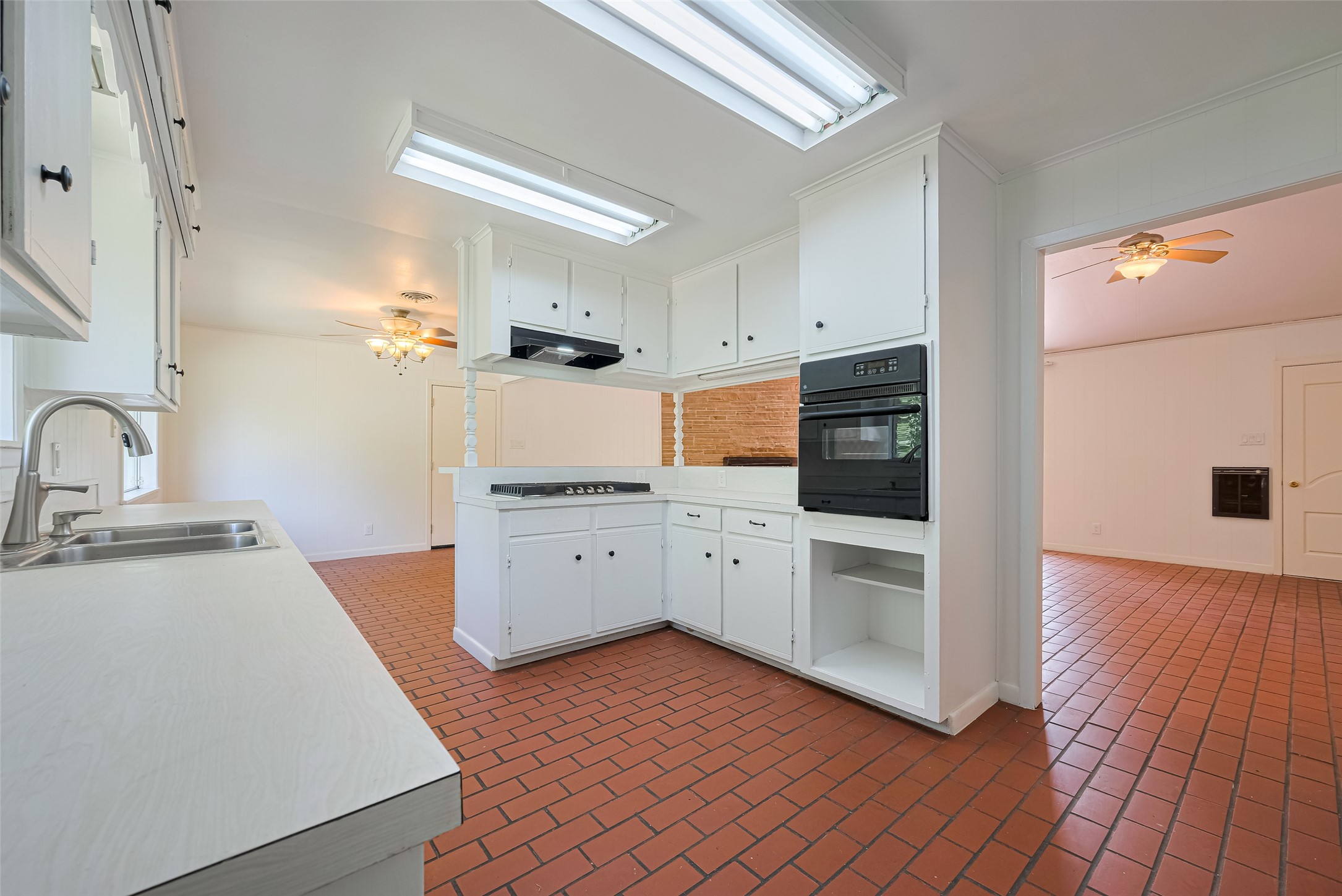 30525 Hegar Road Hockley, TX 77447 - Photo 17 of 49 a kitchen with a refrigerator and a sink