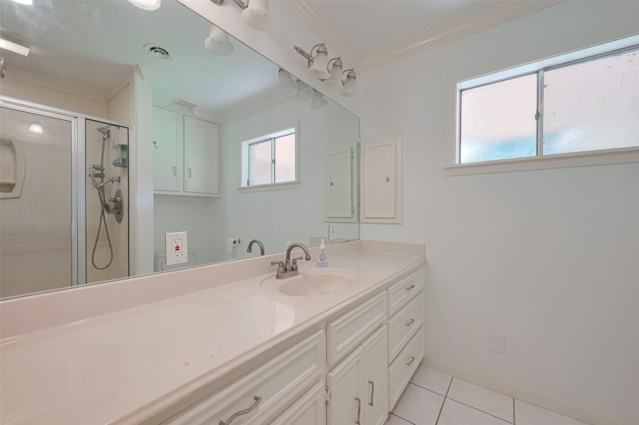 30525 Hegar Road Hockley, TX 77447 - Photo 21 of 49 a bathroom with a sink and a mirror