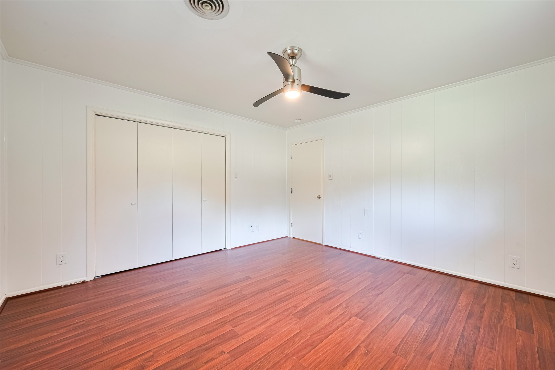 30525 Hegar Road Hockley, TX 77447 - Photo 26 of 49 a view of an empty room with wooden floor and a window