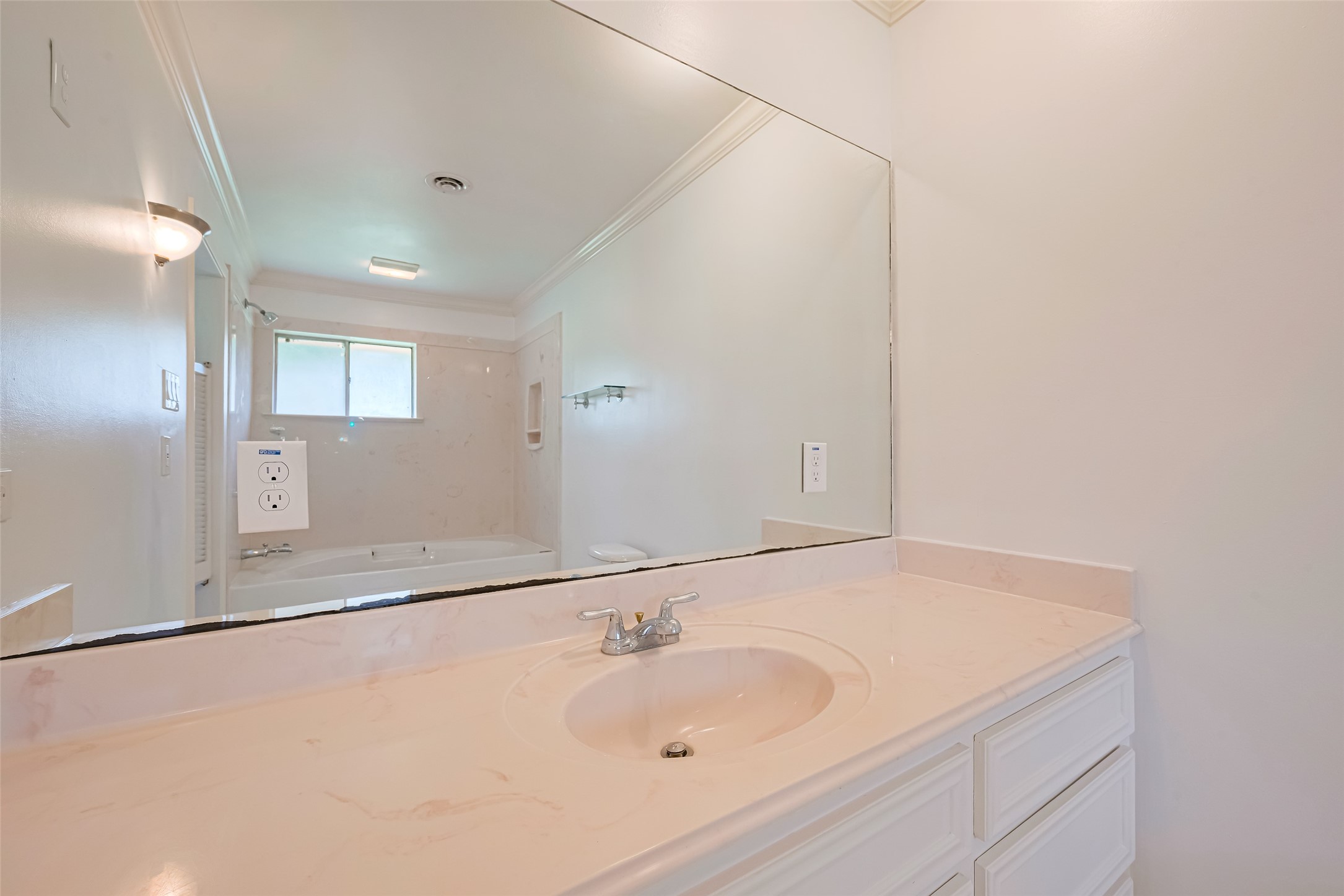 30525 Hegar Road Hockley, TX 77447 - Photo 30 of 49 a bathroom with a sink and a mirror