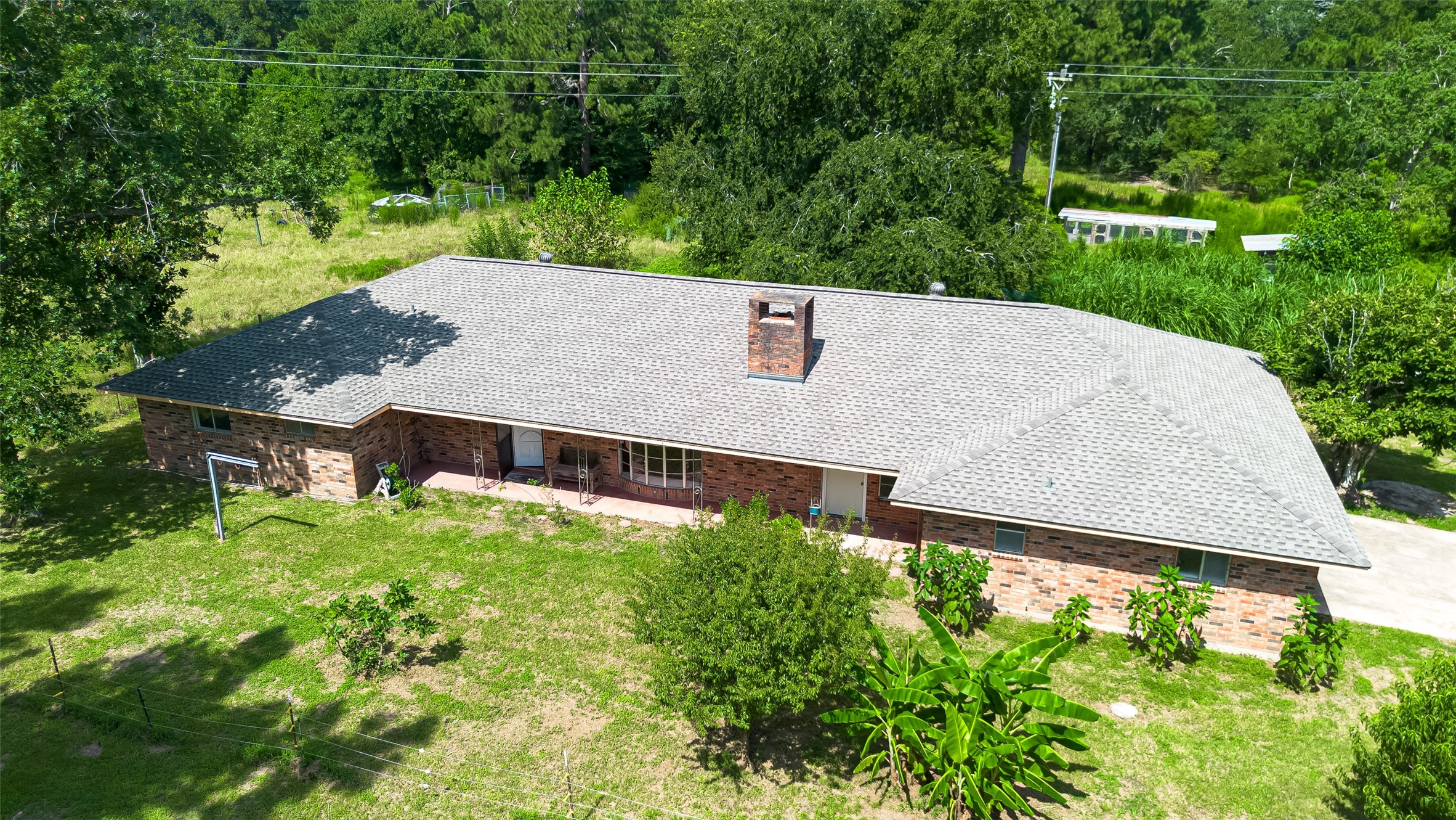 30525 Hegar Road Hockley, TX 77447 - Photo 35 of 49 an aerial view of a house with yard and outdoor seating