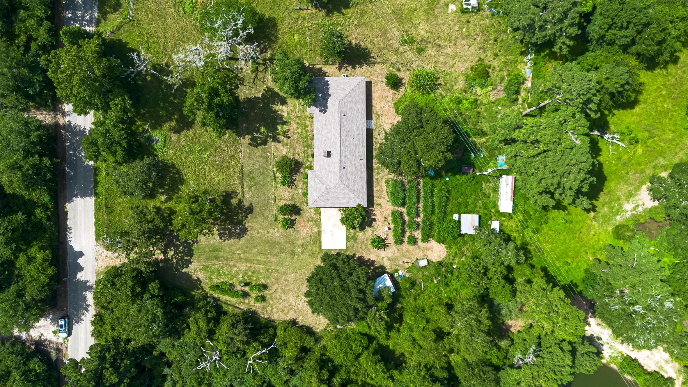 30525 Hegar Road Hockley, TX 77447 - Photo 36 of 49 a view of a garden with large trees