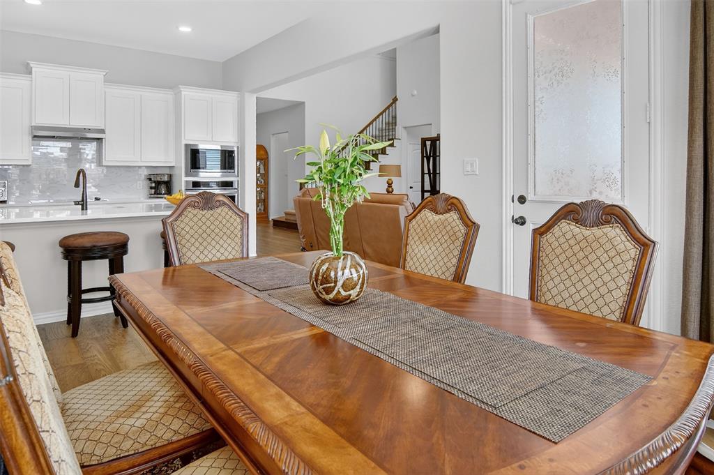 157 Misty Mountain Lane Rhome, TX 76078 - Photo 14 of 40 Dining space featuring light wood-style floors and recessed lighting