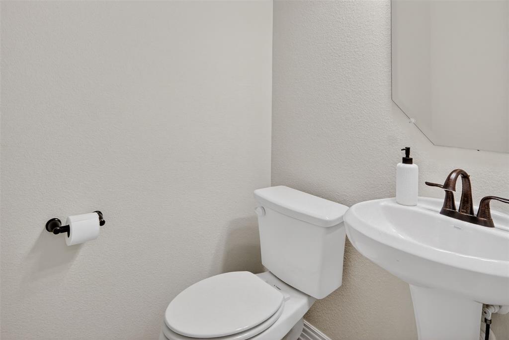 157 Misty Mountain Lane Rhome, TX 76078 - Photo 20 of 40 downstairs half bath