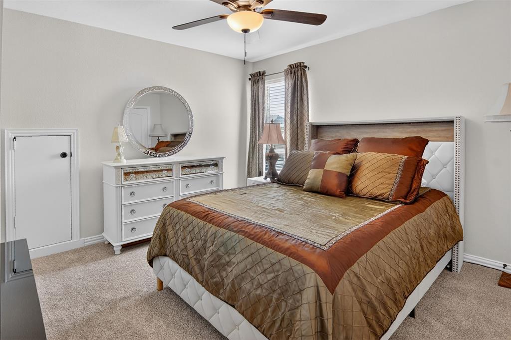 157 Misty Mountain Lane Rhome, TX 76078 - Photo 26 of 40 Bedroom featuring a ceiling fan and light colored carpet