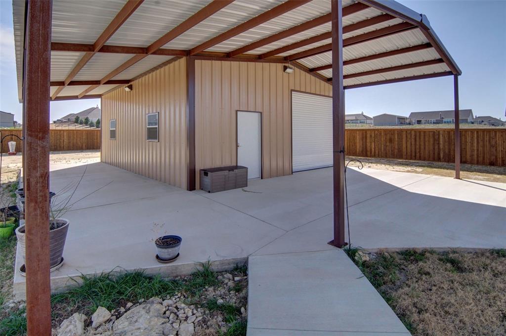 157 Misty Mountain Lane Rhome, TX 76078 - Photo 31 of 40 View of patio of the 40 x 25 workshop