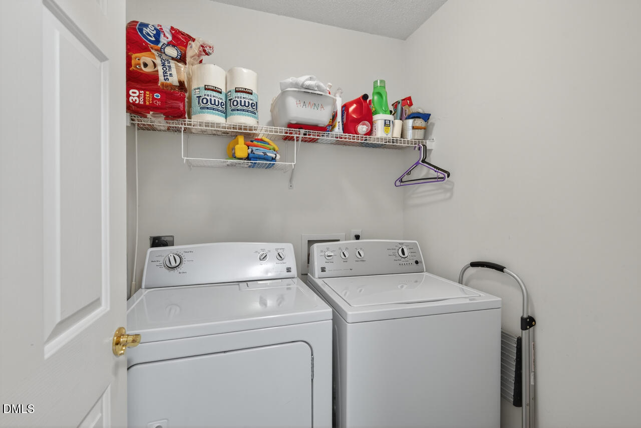 408 Intern Way Durham, NC 27713 - Photo 18 of 27 a utility room with dryer and washer