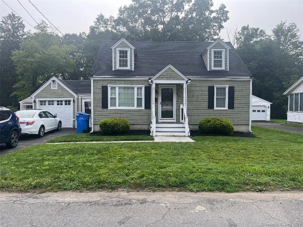 40 Howland Street Waterbury, CT 06708 - Photo 1 of 1 a front view of a house with a yard