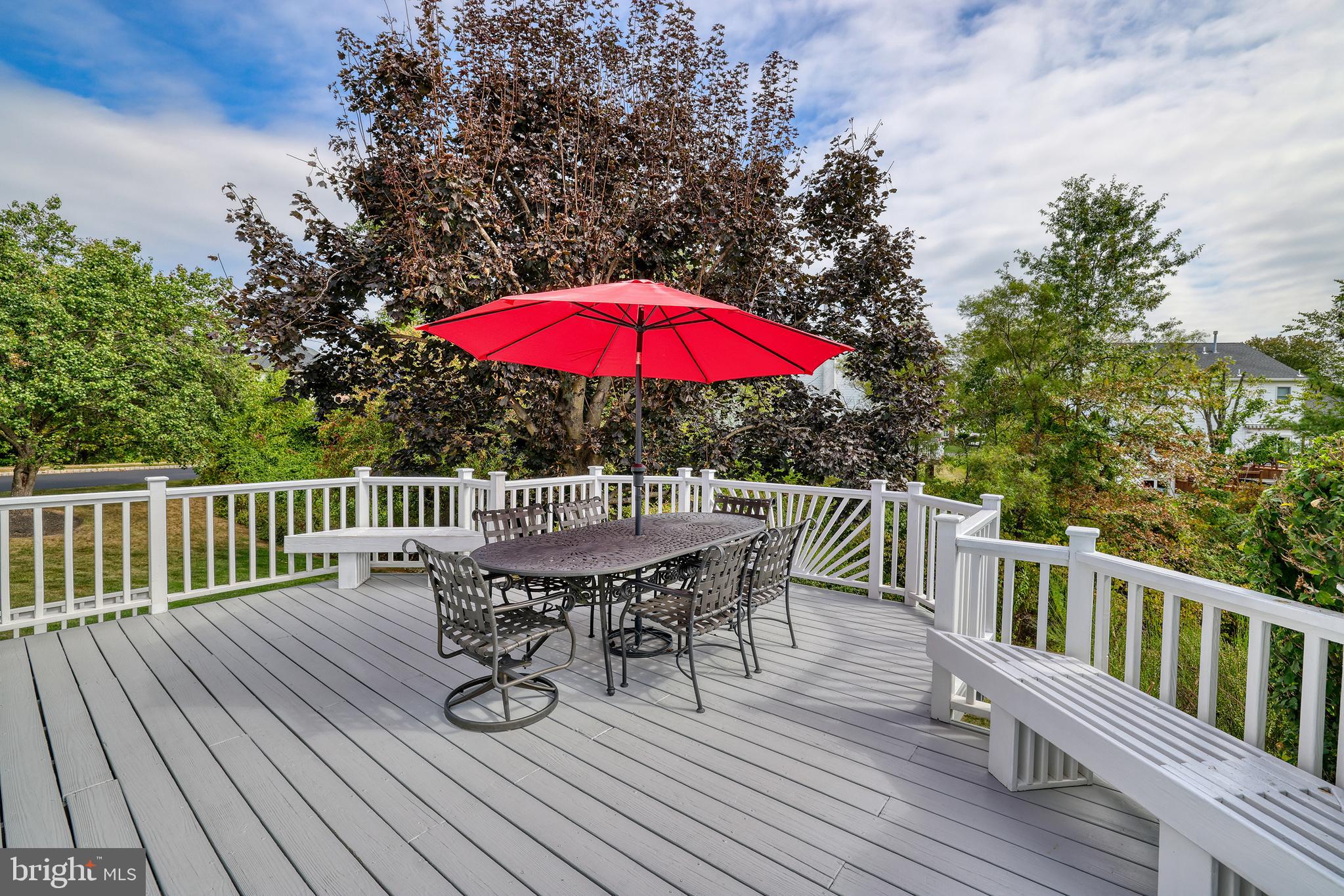 4925 Redfield Road Doylestown, PA 18902 - Photo 14 of 53 a view of balcony with wooden floor and outdoor seating