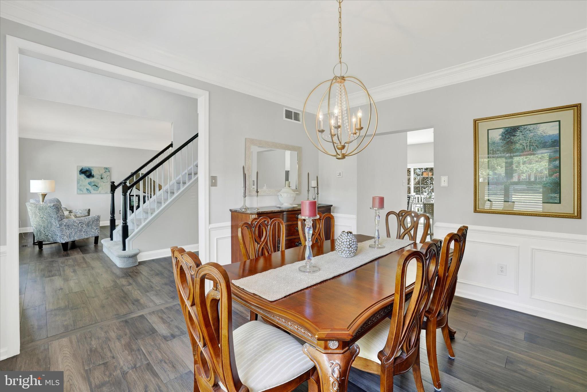 4925 Redfield Road Doylestown, PA 18902 - Photo 23 of 53 a view of a dining room with furniture wooden floor and chandelier