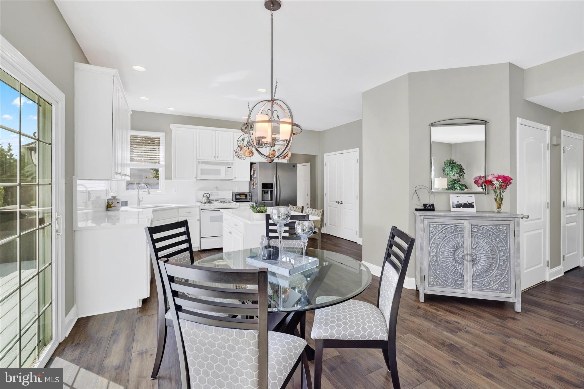 4925 Redfield Road Doylestown, PA 18902 - Photo 25 of 53 a view of a dining room with furniture window and wooden floor