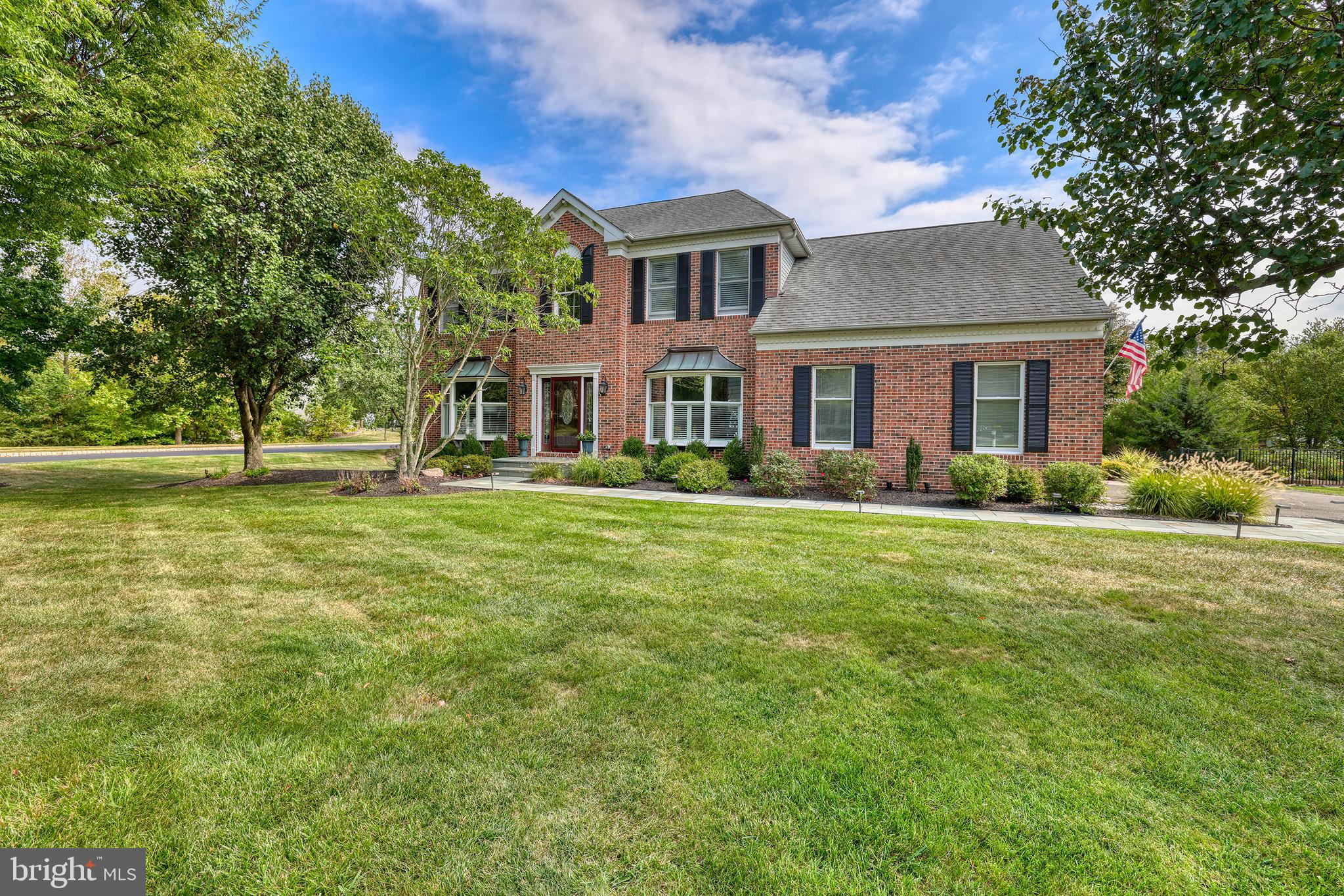 4925 Redfield Road Doylestown, PA 18902 - Photo 3 of 53 a front view of house with yard and green space