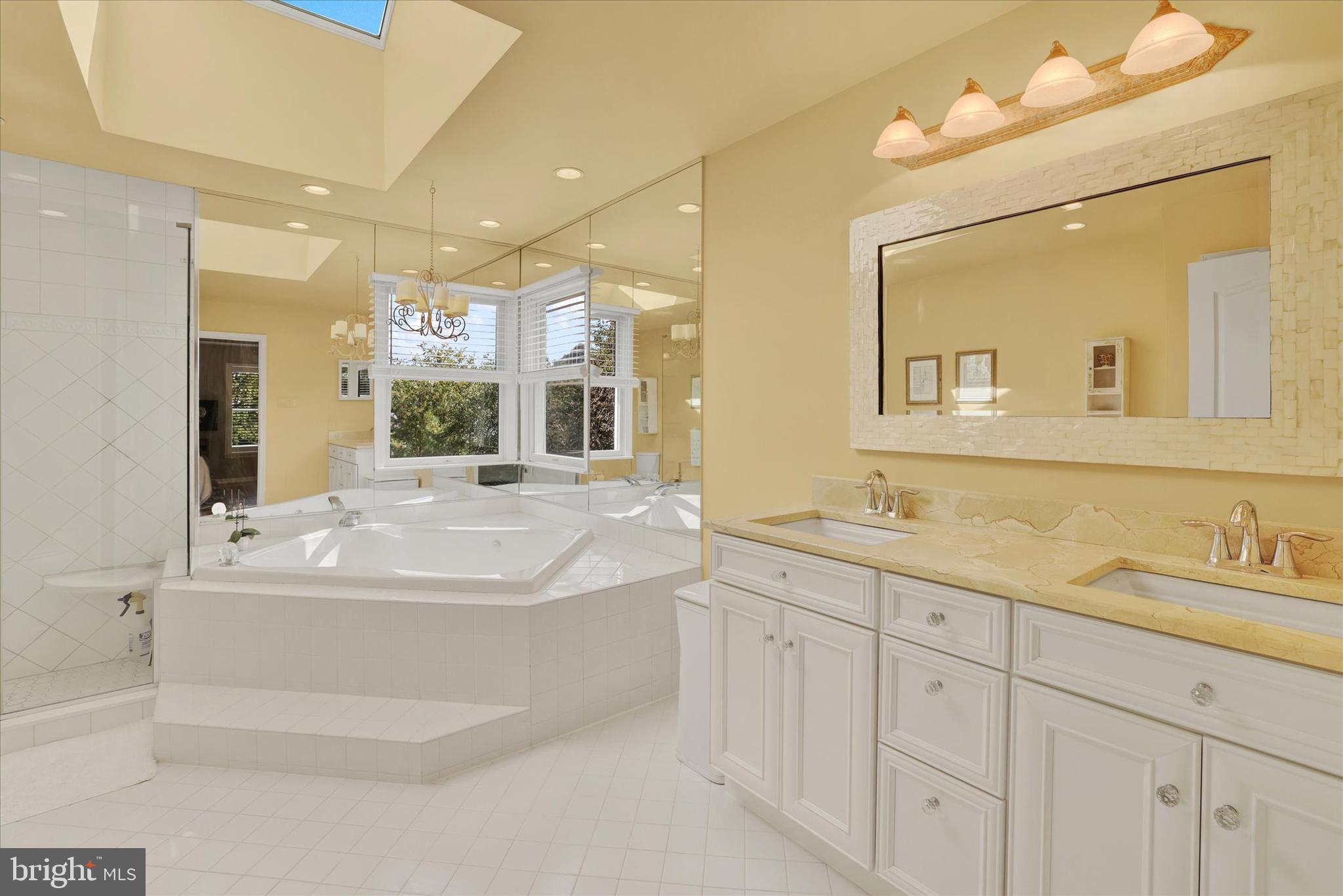 4925 Redfield Road Doylestown, PA 18902 - Photo 38 of 53 a spacious bathroom with a double vanity sink mirror and