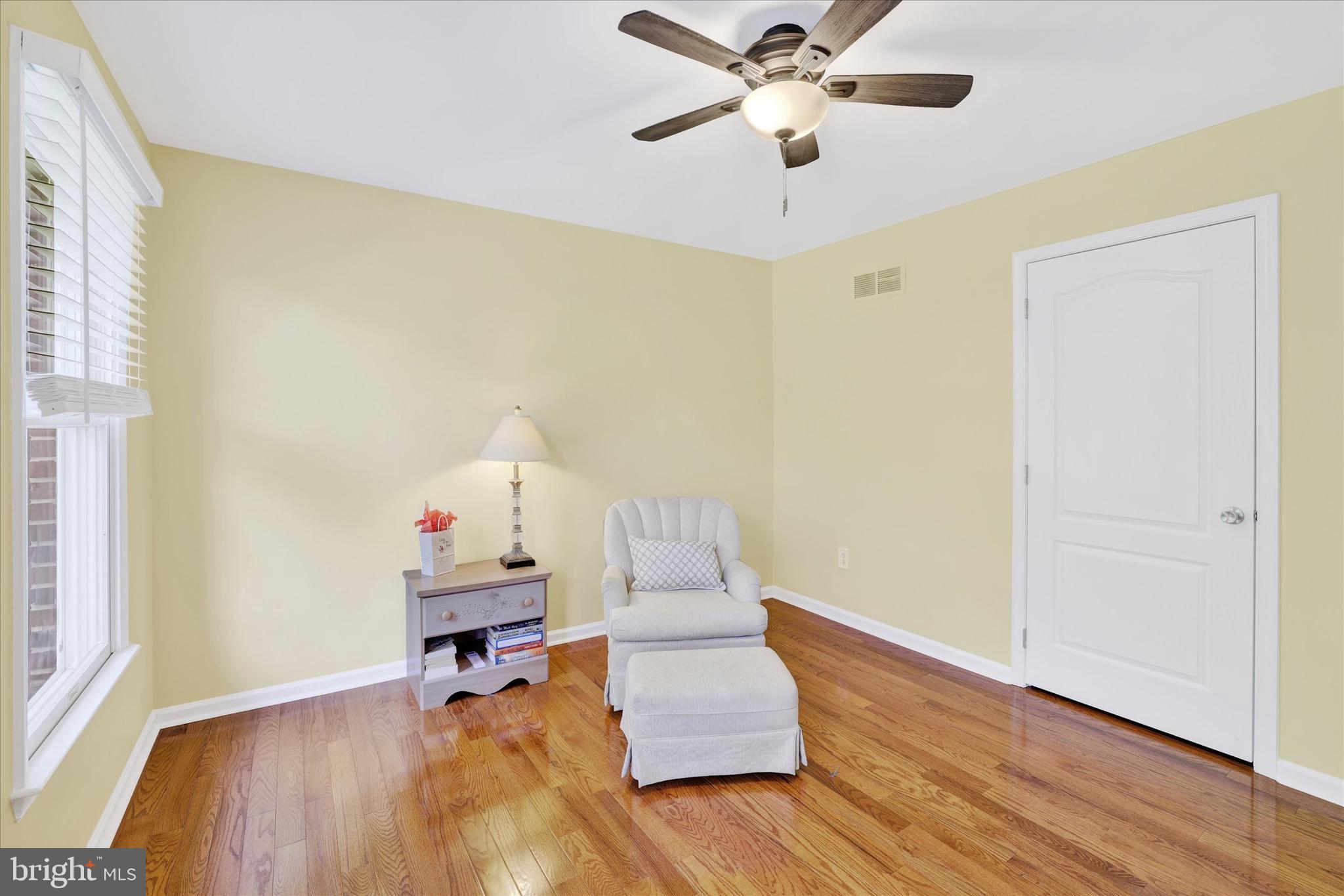 4925 Redfield Road Doylestown, PA 18902 - Photo 42 of 53 a living room with furniture and a wooden floor