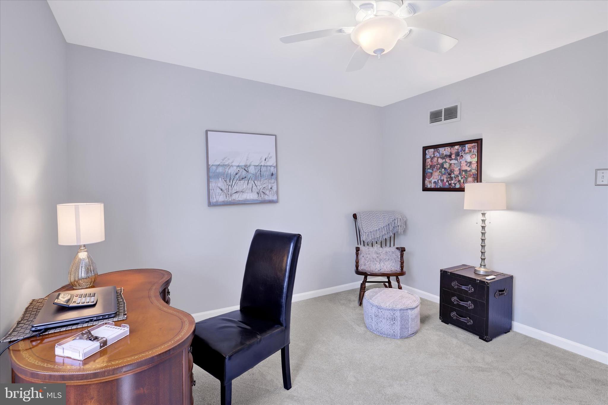 4925 Redfield Road Doylestown, PA 18902 - Photo 46 of 53 a room with furniture and a mirror