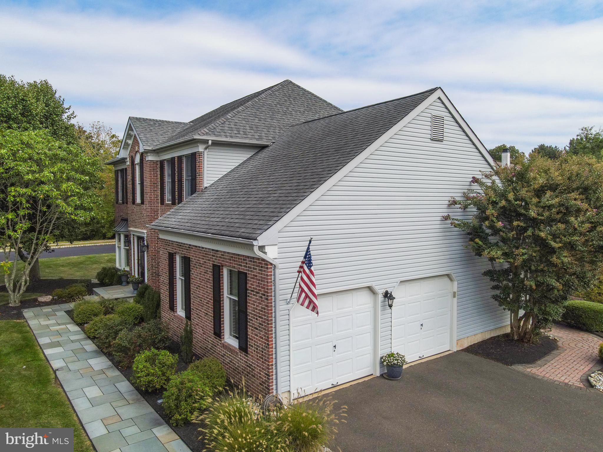 4925 Redfield Road Doylestown, PA 18902 - Photo 7 of 53 a view of a house with a yard and potted plants