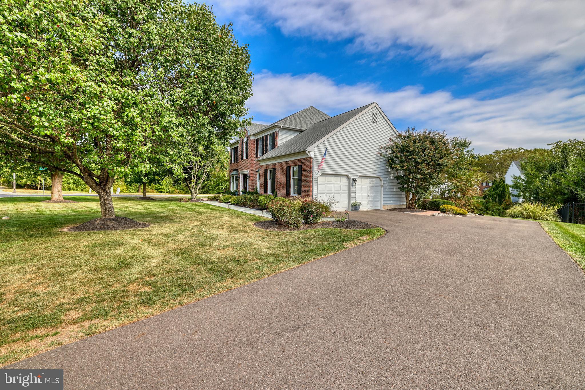 4925 Redfield Road Doylestown, PA 18902 - Photo 9 of 53 a view of a house with a yard and garage