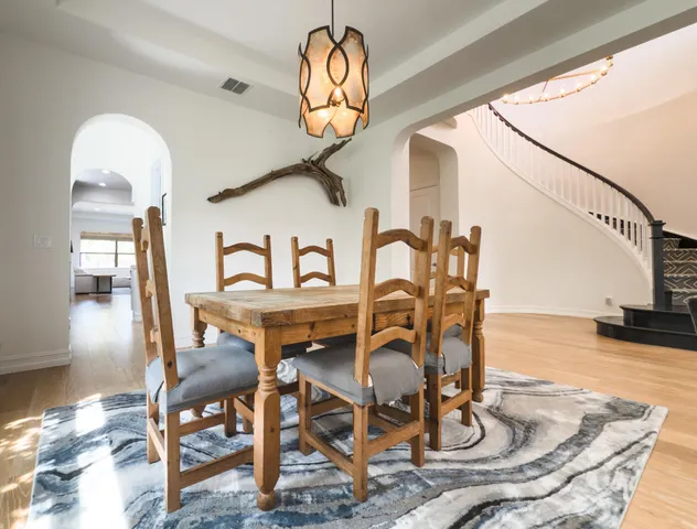 a kitchen with stainless steel appliances granite countertop a stove and a microwave