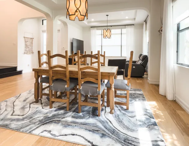 a kitchen with a sink cabinets and window