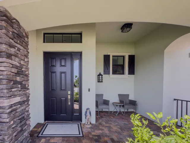 a view of a livingroom with furniture and a window