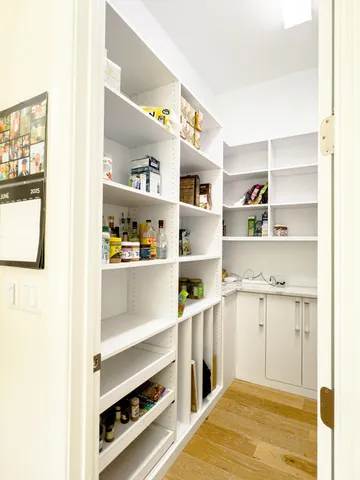 a bed room with a bed and a walk in closet