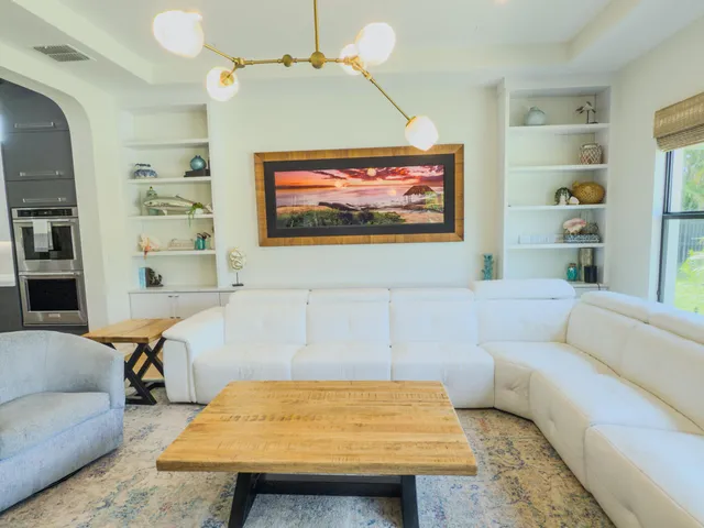 a bedroom with two beds and a flat screen television