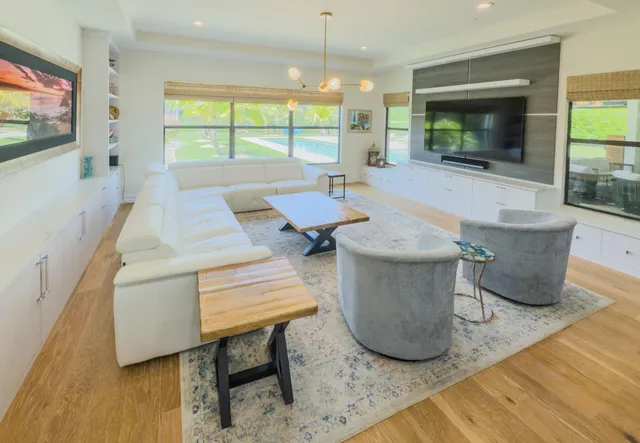 a living room with furniture and window