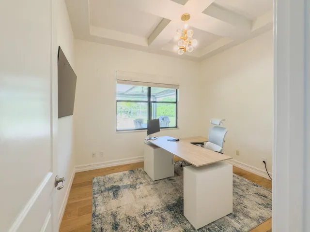 a view of a house with a yard porch and sitting area
