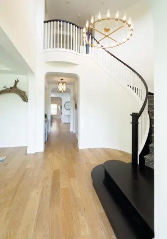 a shelf with books and knick knacks on it