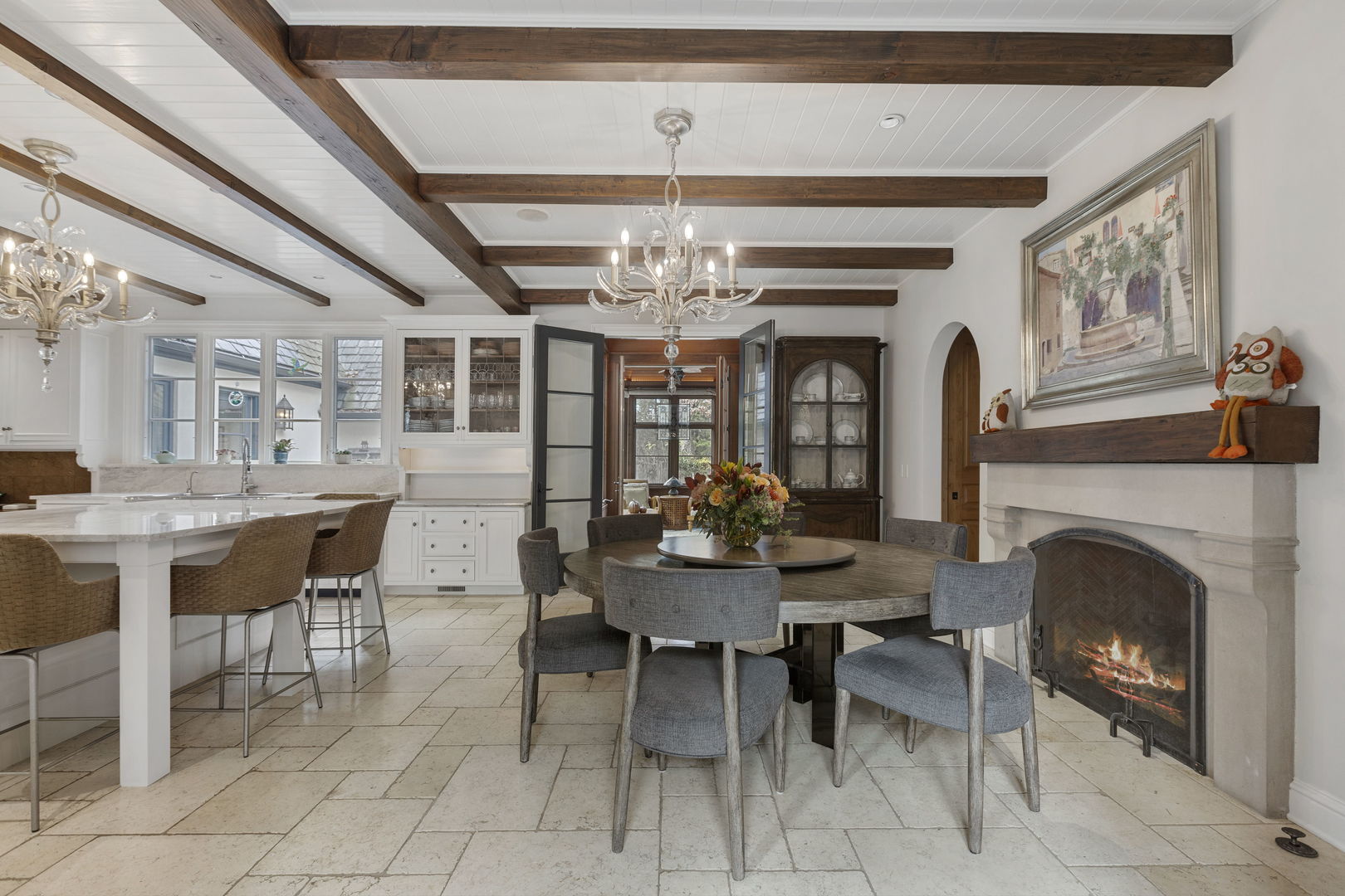 690 South Ridge Road Lake Forest, IL 60045 - Photo 8 of 69 a dining room with furniture a chandelier and a rug