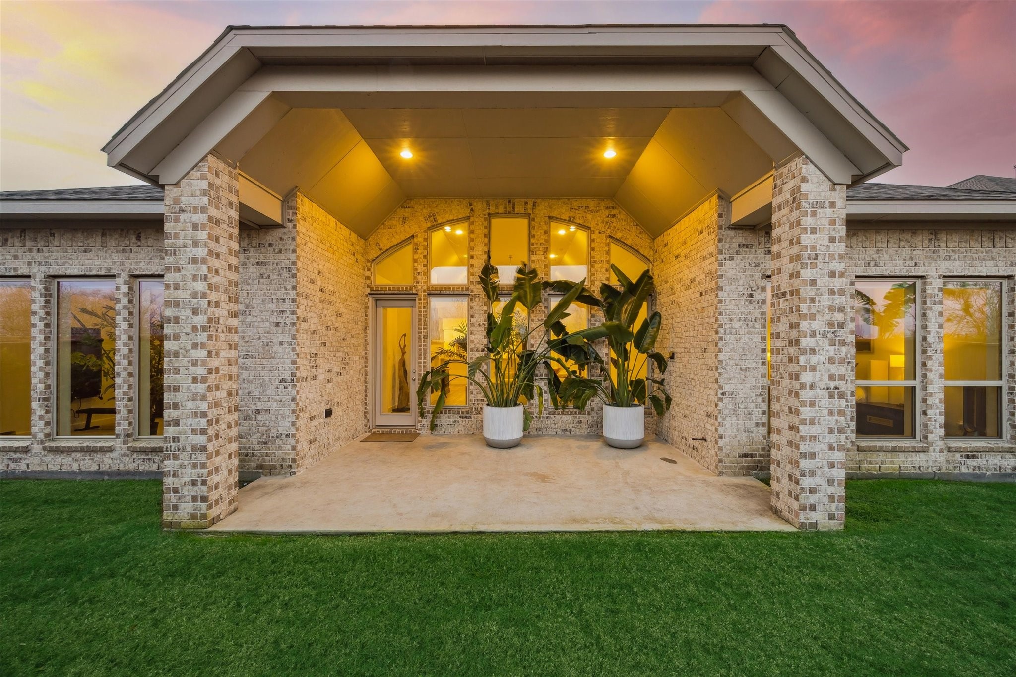 9823 Chapman Trail Manvel, TX 77578 - Photo 29 of 47 Step outside and enjoy this large covered patio. It's the perfect spot to relax at the end of the day or to entertain family and friends.