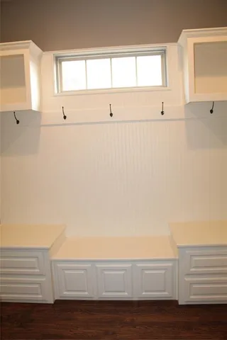 a view of an empty room and window