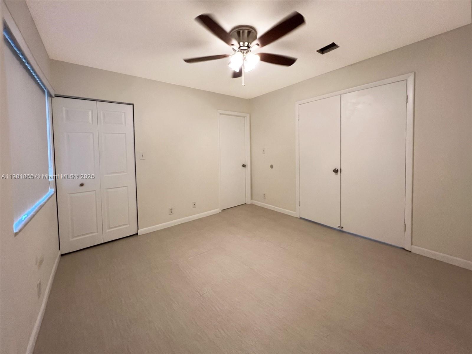 14015 Southwest 91st Terrace, Unit 14015 Miami, FL 33186 - Photo 11 of 20 a view of an empty room