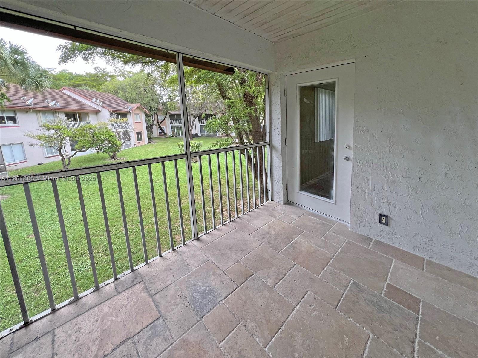 14015 Southwest 91st Terrace, Unit 14015 Miami, FL 33186 - Photo 15 of 20 a view of a balcony