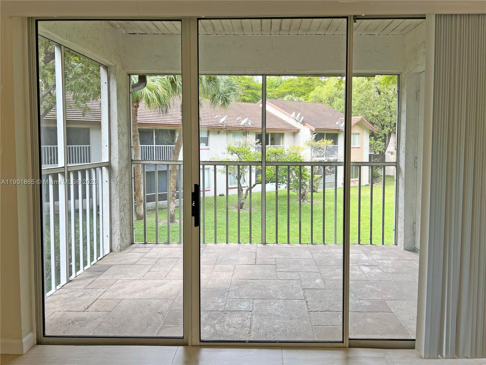 14015 Southwest 91st Terrace, Unit 14015 Miami, FL 33186 - Photo 2 of 20 a view of a balcony