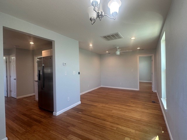 737 Webb Street Corpus Christi, TX 78418 - Photo 2 of 8 a view of an empty room with wooden floor
