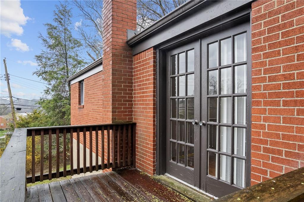 18 Rose Leaf Road Pittsburgh, PA 15220 - Photo 34 of 40 French doors onto a minimal deck
