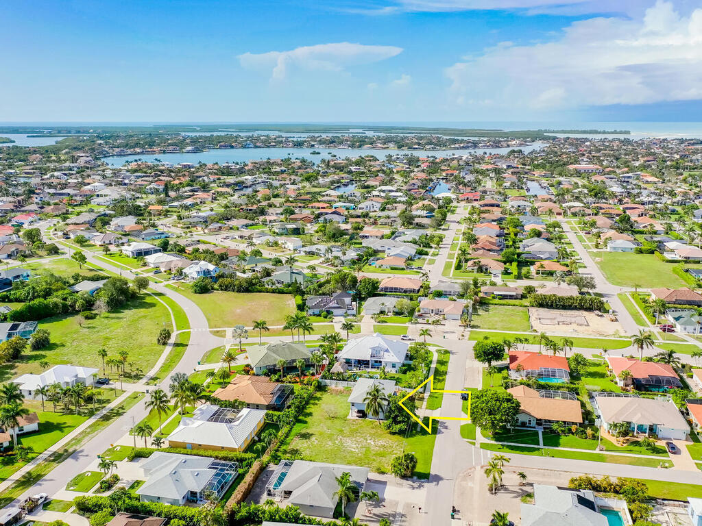 185 Delbrook Way Marco Island, FL 34145 - Photo 3 of 10 an aerial view of residential houses with outdoor space